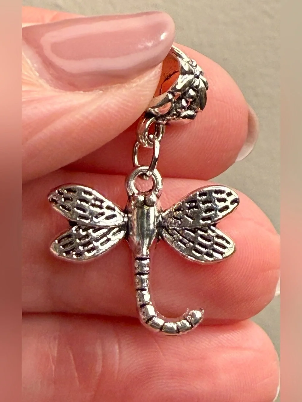 Charm / pendant - dragonfly charm w/butterfly on bail - silver tone. New!